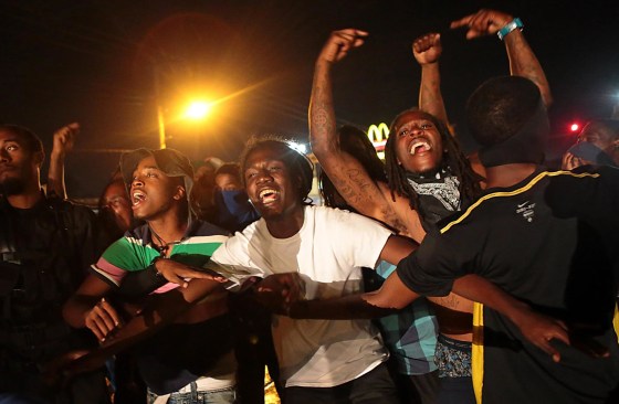 Image: Protestors defy police, take to the streets of Ferguson