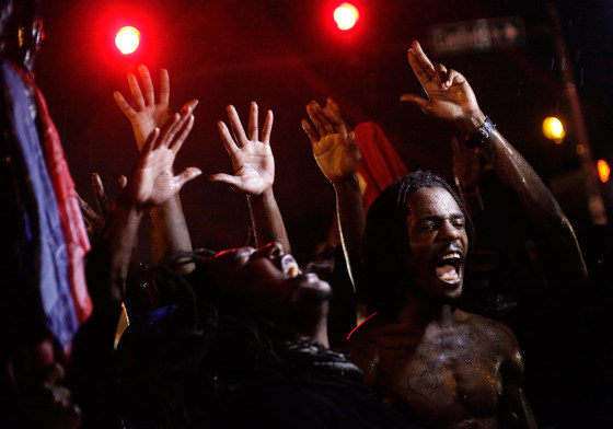 Image: Demonstrators protest against the August 9 police shooting of 18-year-old Michael Brown