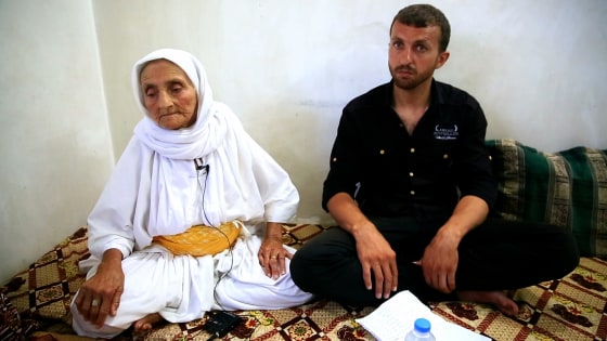 Assad Haig and his grandmother Aissan. The 84-year-old crawled for two days to reach safety after ISIS fighters overran the northern Iraqi town of Sinjar.