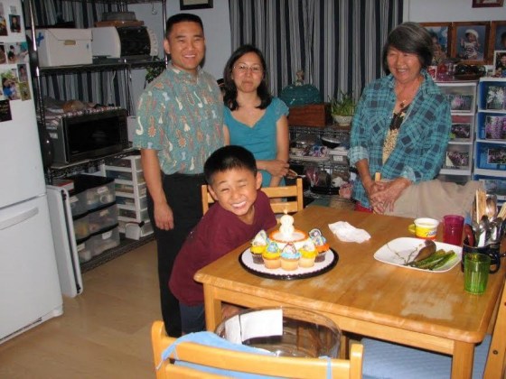 Jenee and Norman Odani, celebrating their son Nick's birthday with his grandmother Judith Ching.