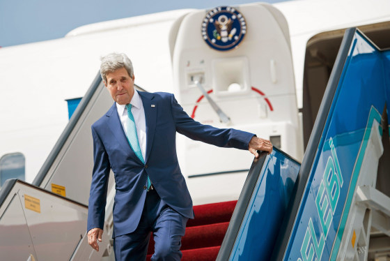 US Secretary of State John Kerry arrives at Ankara International Airport on September 12, 2014. Kerry is in the region to speak with leaders about strategies to address the threat from ISIS. Secretary of State John Kerry said on September 12 that the US would provide an additional $500 million in humanitarian aid to victims of the war in Syria, bringing total American assistance to $2.9 billion since the start of the conflict in 2011. AFP PHOTO/POOL / BRENDAN SMIALOWSKIBRENDAN SMIALOWSKI/AFP/Getty Images