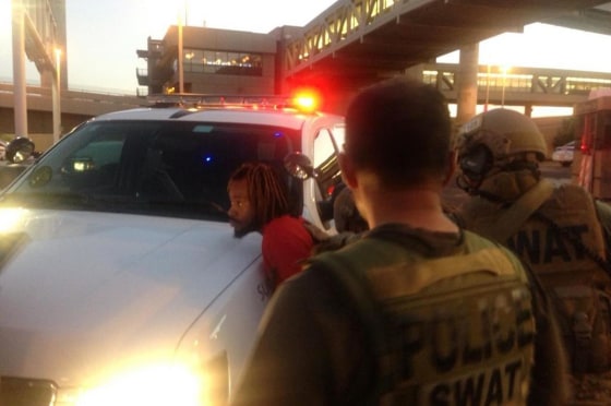 Image: A suspect has been arrested after a part of the Phoenix airport was on lockdown for several hours Thursday as police sought one of two suspects in a shooting in nearby Tempe