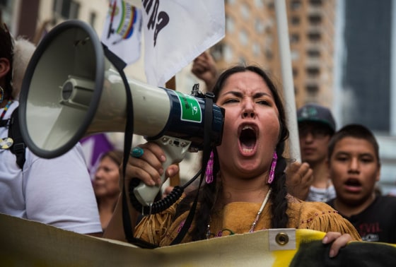 Image: People protest for greater action against climate change during the People's Climate March