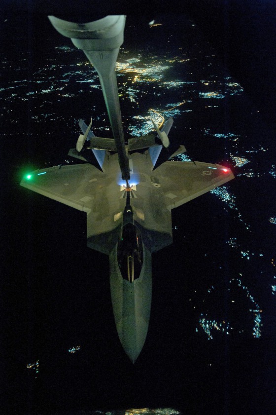 Image: U.S Air Force KC-10 Extender refuels an F-22 Raptor fighter aircraft