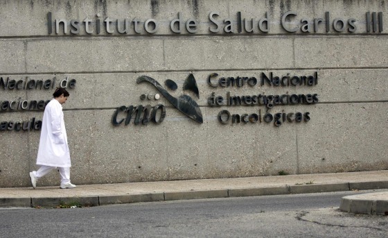 Image: Doctor walks outside Carlos III hospital in Madrid, where a Spanish nurse who contracted Ebola is being treated
