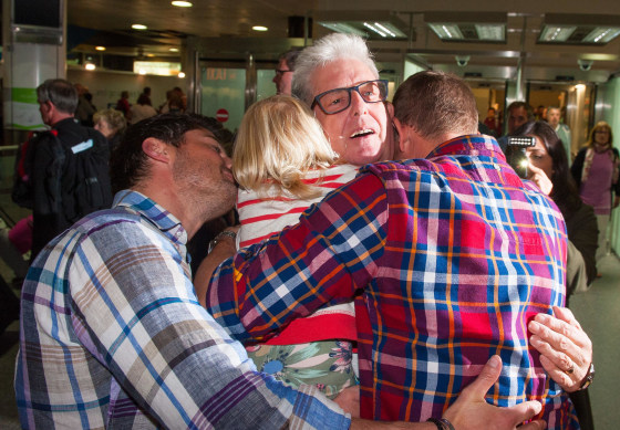 Image: Ray Cole is greeted at Gatwick Airport