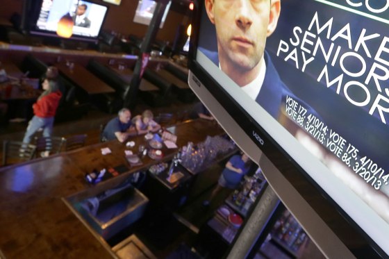 File photo of a political ad on one of the televisions at Gusano’s, a downtown Little Rock, Ark., restaurant.