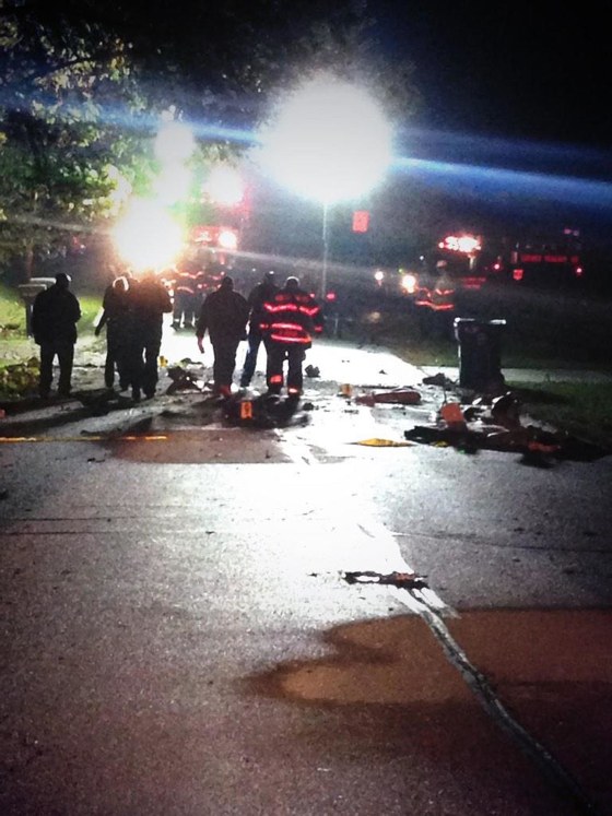 Emergency responders near the scene where a small plane crashed in a Chicago suburb.