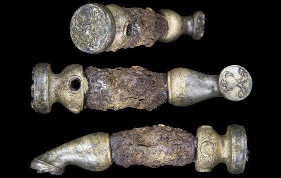 A linch pin (shown from three angles) from an Iron Age chariot that were discovered at the Burrough Hill Iron Age Hillfort in Leicestershire, England.