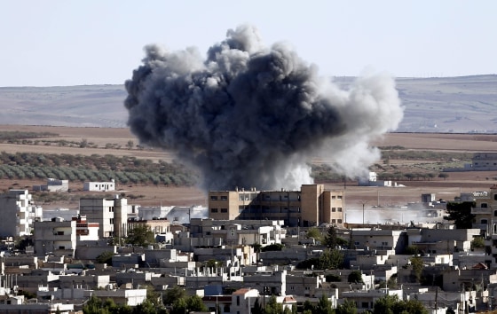 An explosion after an apparent US-led coalition airstrike on Kobani, Syria, seen from the Turkish side of the border, near Suruc district, Sanliurfa, Turkey, 20 October 2014. According to reports, YPG fighters have made gains against IS militants in their defence of the besieged town of Kobane, following over 50 airstrikes around the town carried out by the international anti-IS coalition which according to the Pentagon have killed hundreds of IS militants in the operation now named Inherent Resolve. 