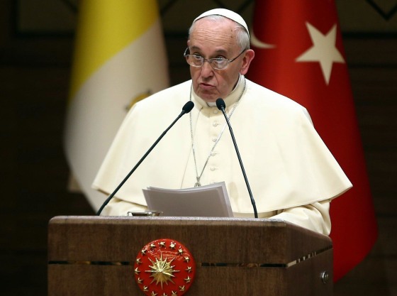 Pope Francis speaks during a joint press conference with the Turkish president at the presidential palace in Ankara on November 28, 2014. Pope Francis called for dialogue between faiths to end the Islamist extremism plaguing the Middle East as he visited Turkey for his first visit to the overwhelmingly Muslim but officially secular state.