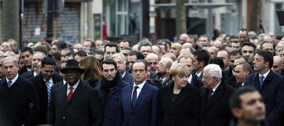 Israeli Prime Minister Benjamin Netanyahu, Malian President Ibrahim Boubacar Keita, a bodyguard, French President Francois Hollande, German Chancellor Angela Merkel, Palestinian President Mahmud Abbas and Italian Prime Minister Matteo Renzi take part in a unity rally Sunday in Paris.