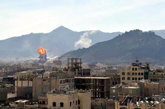 A general view shows smoke and flames rising during heavy clashes between presidential guards and Shiite Houthi rebels in Sanaa, Yemen, on Jan. 19, 2015. EPA/STRINGER