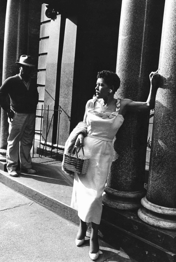 Image: Billie Holiday poses outside apartment house in 1956
