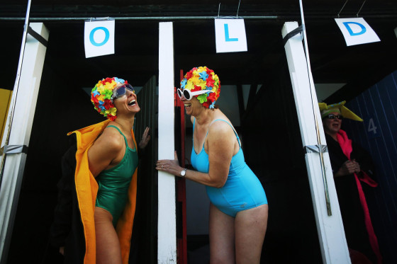Image: Swimmers prepare to get into the water during the UK Cold Water Swimming Championships at Tooting Bec Lido in south London