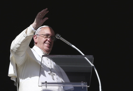 Image: Pope Francis waves during his Sunday Angelus prayer in Saint Peter's square at the Vatican