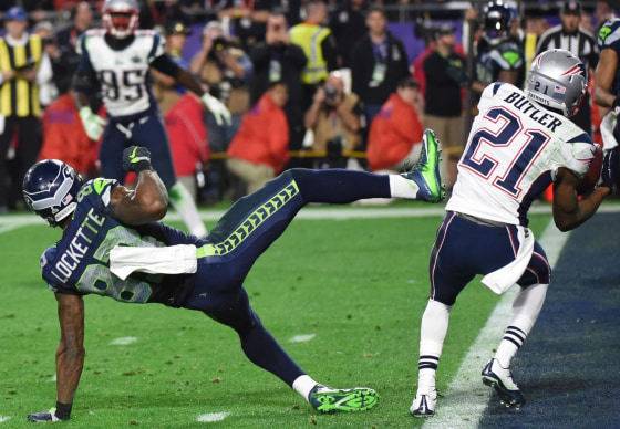 TOPSHOTS Malcolm Butler (R) of the New England Patriots intercepts a pass intended for Ricardo Lockette (L) of the Seattle Seahawks late in the fourth quarter of Super Bowl XLIX on February 1, 2015 at University of Phoenix Stadium in Glendale, Arizona. The New England Patriots defeated the Seattle Seahawks 28-24. AFP PHOTO / TIMOTHY A. CLARYTIMOTHY A. CLARY/AFP/Getty Images
