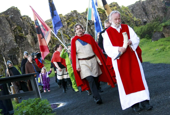 Image: The high priest of the Asatru Association Hilmarsson leads a procession of Asatru Association at Pingblot (Thing blot)