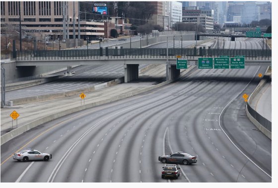 Interstates 75 and 85 were closed for 2½ hours Monday before police blew up an art project that they said they had to treat as a suspicious device.