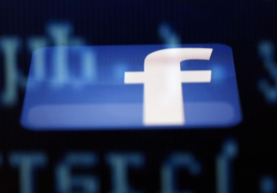 Image: File photo illustration of a Facebook logo