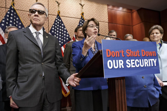 Image: Harry Reid, Amy Klobuchar