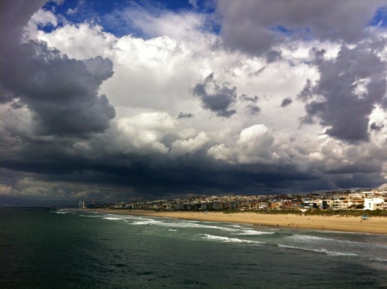 Image: Sunlight breaks through a band of heavy clouds
