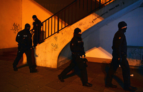 Police officers walk at an Islamic Cultural Centre that was searched in Bremen, Germany, 28 February 2015. Several people were arrested after German police issued a warning on 28 February that there was an imminent threat of a violent Islamist attack on the northern port city of Bremen. A federal authority has been receiving tip-offs since the previous evening about the activities of potential Islamist threats, the police said.
