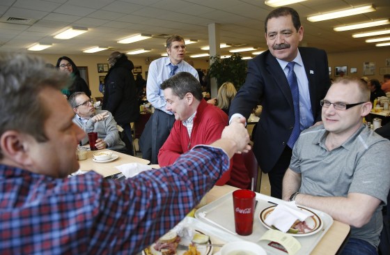 Image: File photo of Chicago Mayoral candidate Jesus \"Chuy\" Garcia greeting restaurant patrons, during a campaign stop on election day in Chicago