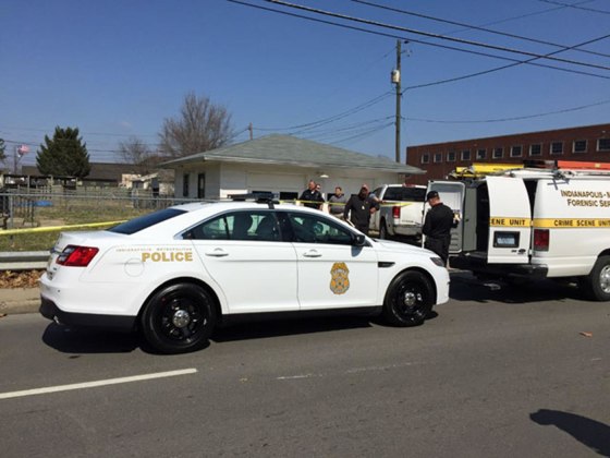 Police at the scene of where a man shot his brother during a home invasion in Indianapolis.