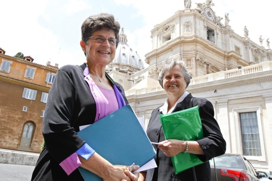 Image: Sister Farrell and Sister Mock smile following a meeting with Cardinal William Levada at the Vatican
