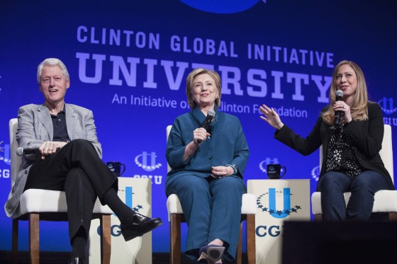 Image: File photo of Bill, Hillary and Chelsea Clinton, discussing Clinton Global Initiative University during closing plenary session on second day of 2014 Meeting of Clinton Global Initiative University at Arizona State University in Tempe