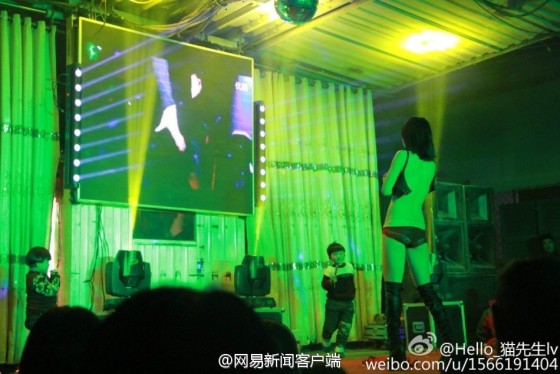 Image-Stripper performs in a funeral in China