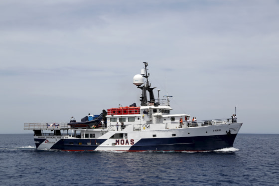 Image: The Migrant Offshore Aid Station ship MV Phoenix sails out of Valletta's Grand Harbour