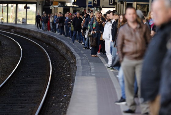 Image: Commuters wait for rare trains in Duisburg, Germany