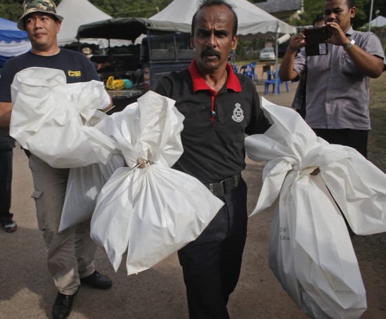 Image: Malaysia finds 139 graves of suspected trafficking victims