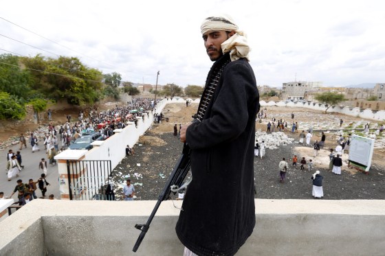 Image: Houthi supporters bury militia members in Sana'a