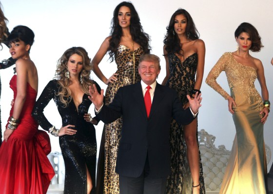 Image: File photo of Donald Trump posing with Miss Universe winners during a pageant photo shoot in New York