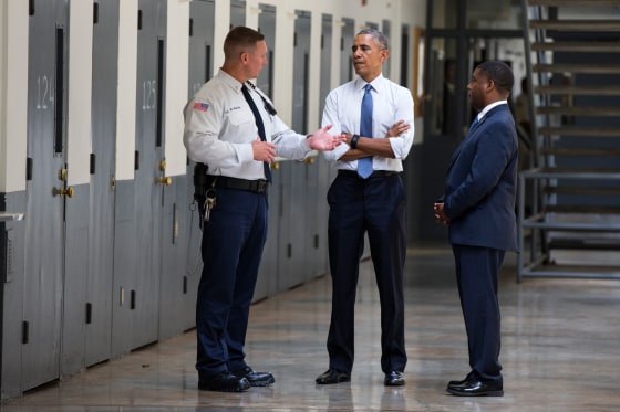 Image: President Barack Obama is led on a tour of the El Reno Federal Correctional Institution in El Reno, Okla.
