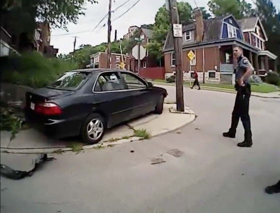 Image: Body cam video shows University of Cincinnati police officer Ray Tensing standing near Dubose vehicle in Cincinnati