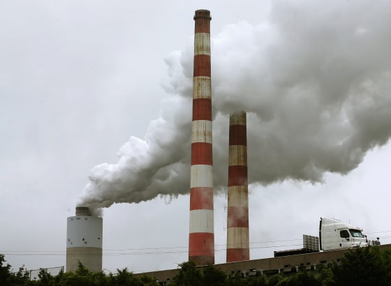 Image: Emissions spew out of a large stack at the coal fired Morgantown Generating Station, in Newburg, Md.