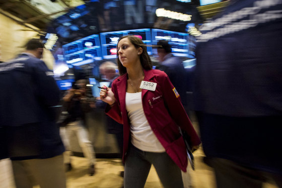 Traders work on the floor of the New York Stock Exchange.