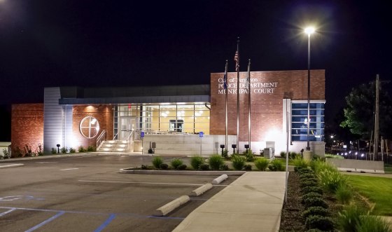 Image: An empty parking lot is seen outside the Ferguson Police Department