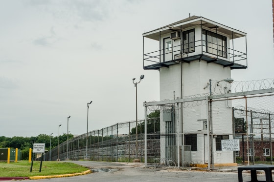Stephen Moyer, Secretary of the Maryland Dept of Public Safety and Correctional Services, tours the Correctional Institution for Women with the warden, Margaret Chippendale.