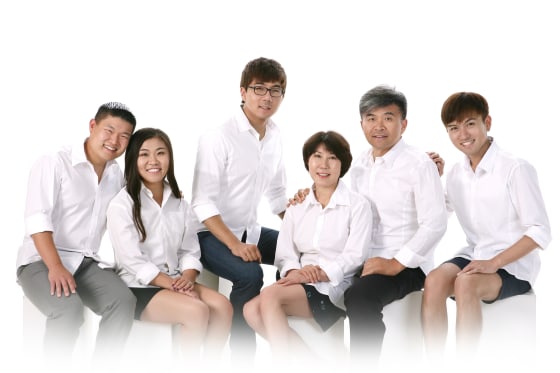 A family portrait Left to right Lee and Whitney Fritz, older brother Seong bae omma appa and brother Hyun bae 