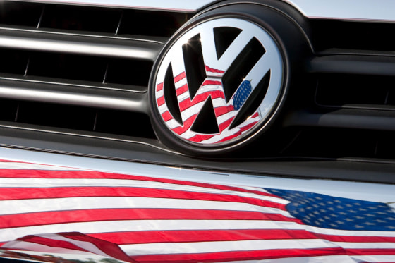 Image: VW logo with American flag reflection