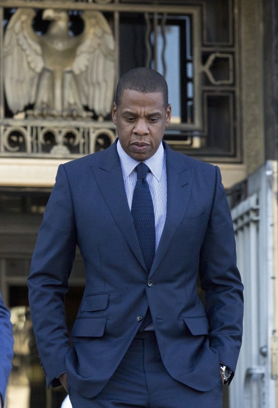 Image: Rapper Jay Z leaves a United States District Court after opening statements and jury selection in downtown Los Angeles