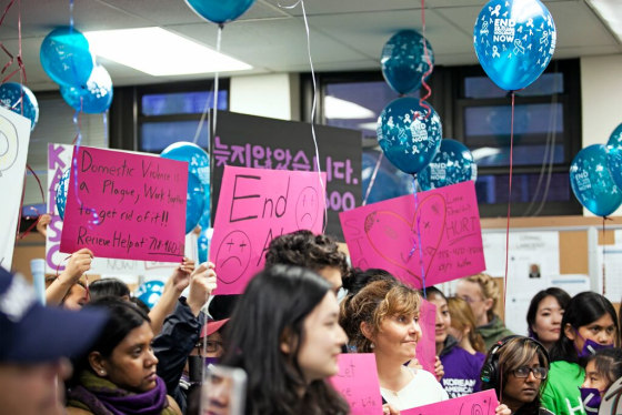 Participants gather at the 109th Precinct on Oct. 2, 2015 for the 18th Annual Silent March against Domestic Violence, a Korean American Family Service Center-led event that rallies community organizations, elected officials and community members across the city to raise awareness around the issue of domestic violence.