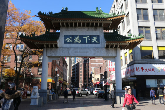 A view of Boston's Chinatown Gate from within Chinatown, looking out towards the I-93 ramps.