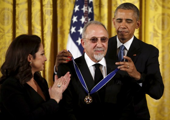 Image: U.S. President Barack Obama presents the Presidential Medal of Freedom to producer Emilio Estefan as he stands next to his wife Gloria Estafan during an event in the East Room of the White House in Washington