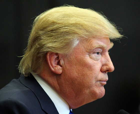 Image: Trump listens to a question